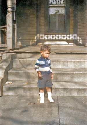 Sol Francis Karp in front of William J. Dumes' house at 504 1st Street in Vincennes.